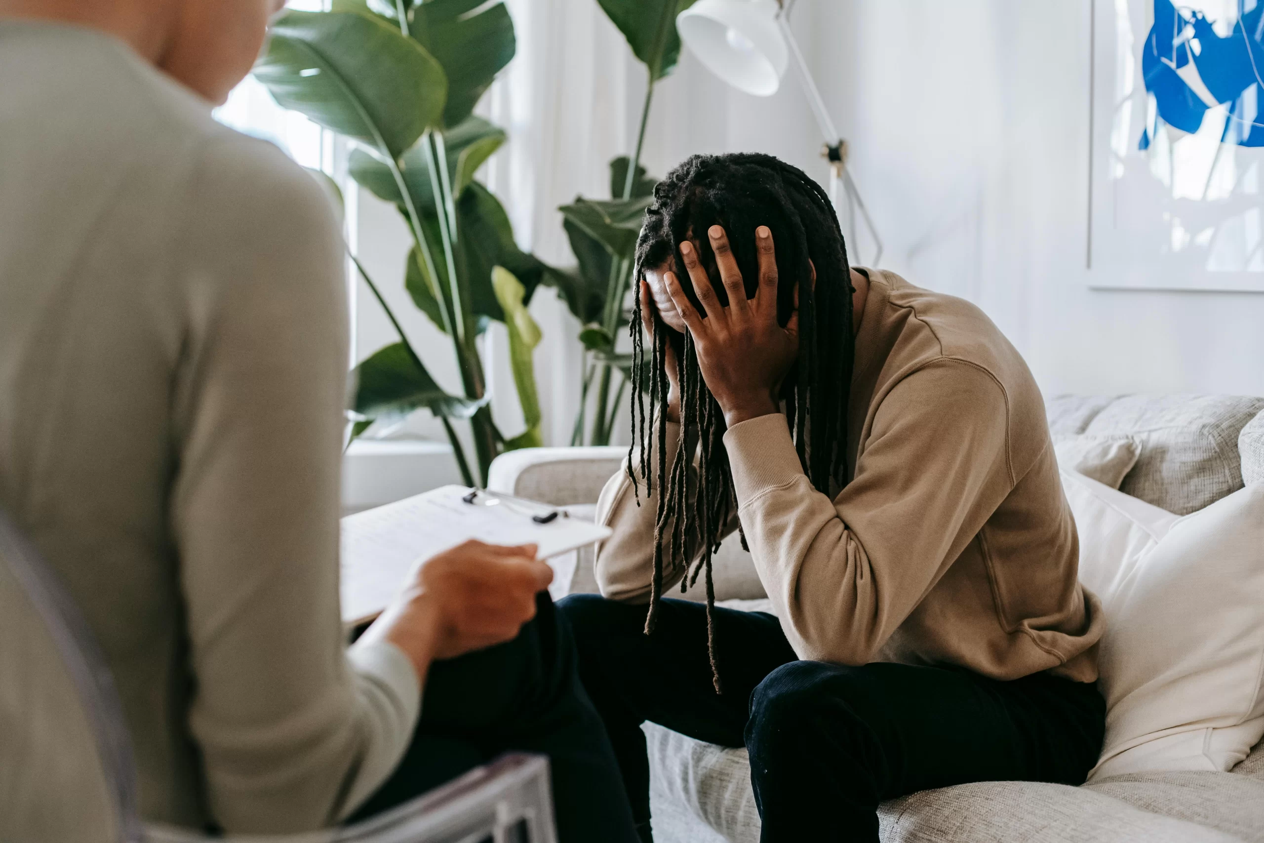 Picture of a young man in a trauma-informed counseling session